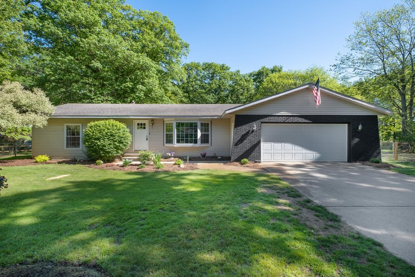 Immaculate and up-to-date ranch home on 4.45 acres located - Beach Home for sale in West Olive, Michigan on Beachhouse.com