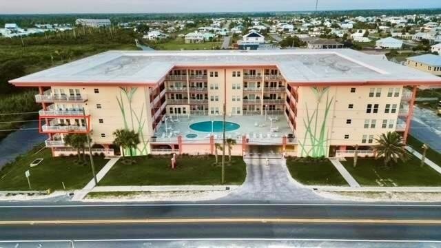 Welcome to your coastal sanctuary! This stunning second-floor - Beach Condo for sale in Mexico Beach, Florida on Beachhouse.com