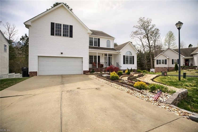 Beautifully situated with outstanding views of Scotts Pond, this - Beach Home for sale in Williamsburg, Virginia on Beachhouse.com
