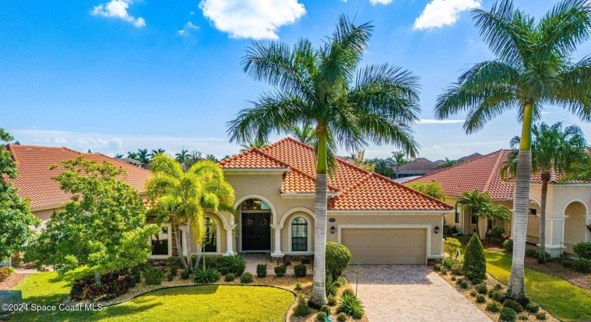 Situated in the sought-after and gated/tile roof community of - Beach Home for sale in Melbourne, Florida on Beachhouse.com