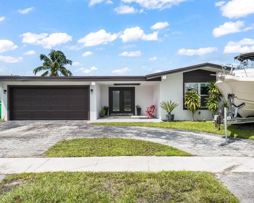 Discover this exquisite 4 bed, 3 bath modern- contemporary home - Beach Home for sale in Sunrise, Florida on Beachhouse.com