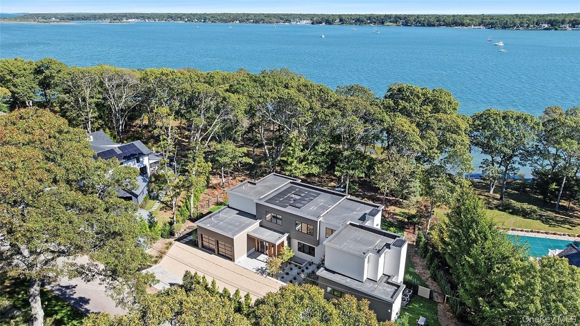 Newly completed and design-driven, this waterfront home makes a - Beach Home for sale in East Hampton, New York on Beachhouse.com