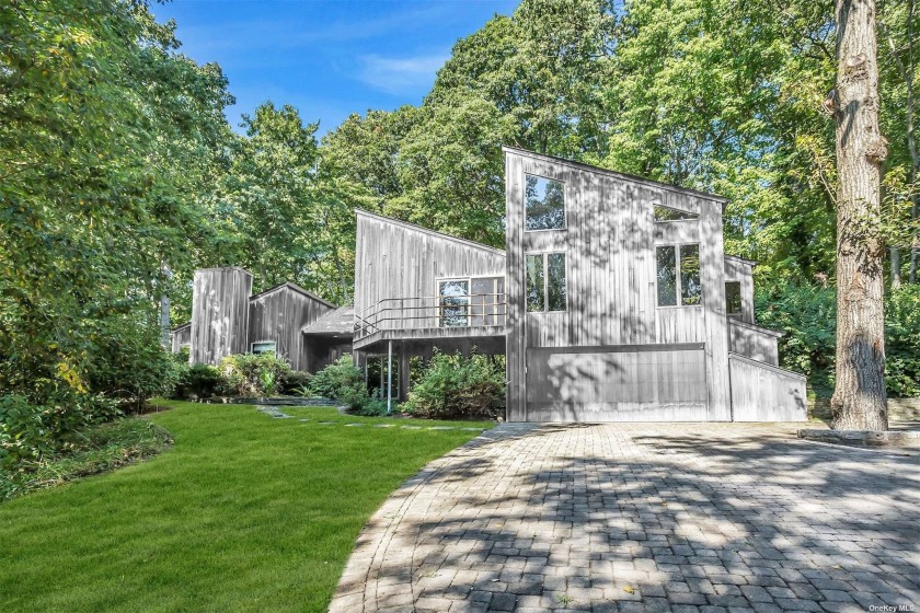 This unique custom contemporary is located in beautiful Mill - Beach Home for sale in Mill Neck, New York on Beachhouse.com