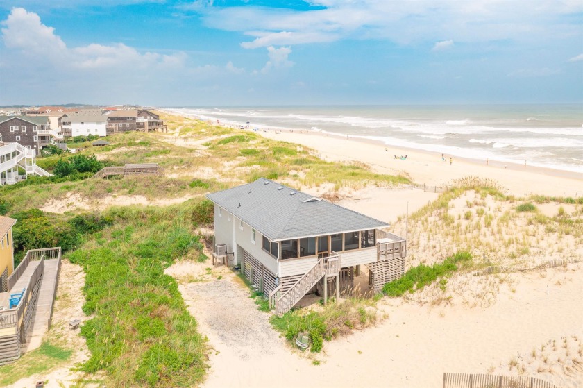 Drop your cares at the door as you are lulled into relaxation by - Beach Home for sale in Nags Head, North Carolina on Beachhouse.com