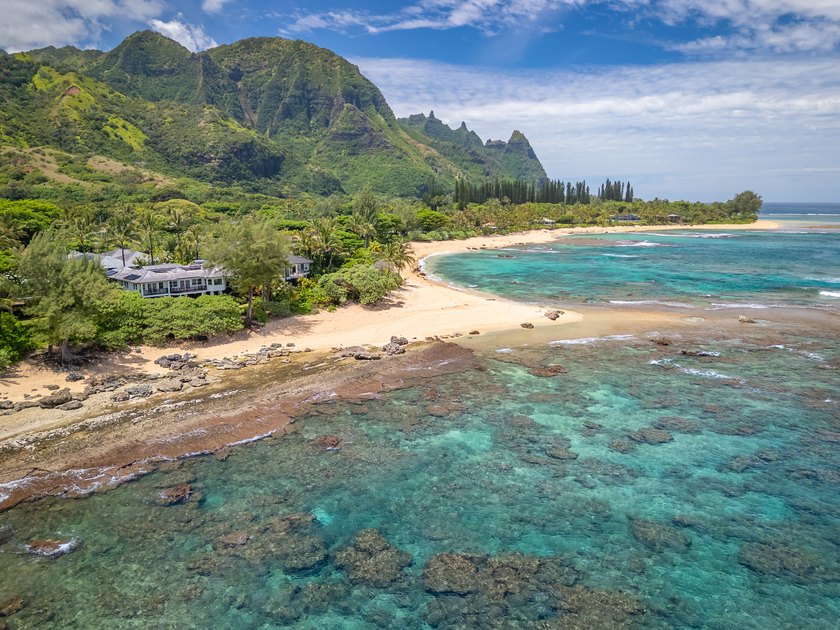 Set directly above the golden sand in Ha'ena on Kaua'i's North - Beach Home for sale in Hanalei, Hawaii on Beachhouse.com