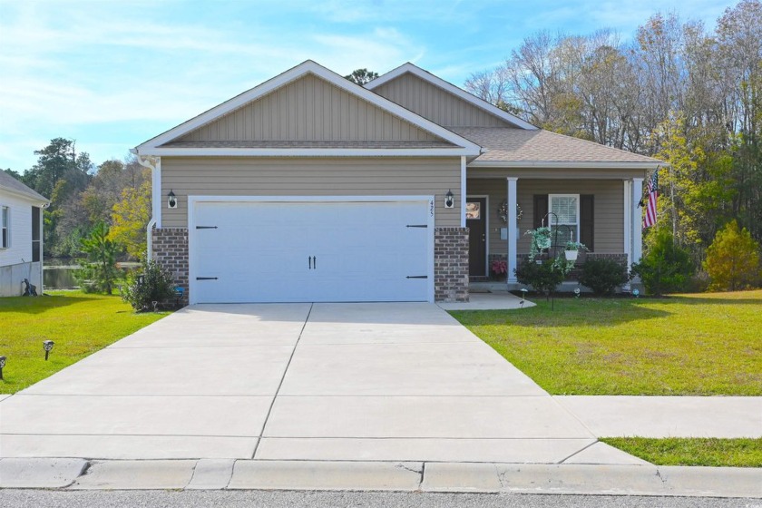 Step into this charming three-bedroom, two-bathroom haven - Beach Home for sale in Georgetown, South Carolina on Beachhouse.com