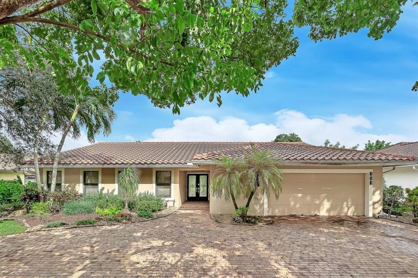 Spacious 4BD, 2.5BA waterfront pool home in desirable Cypress - Beach Home for sale in Coral Springs, Florida on Beachhouse.com