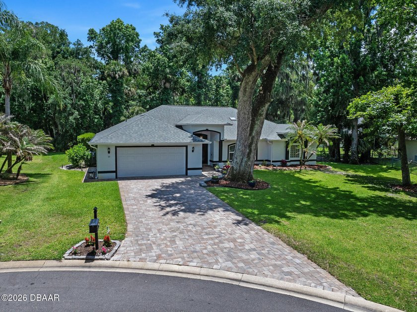 Stunning Move-In Ready Pool Home with Luxury Outdoor Living - Beach Home for sale in Ormond Beach, Florida on Beachhouse.com