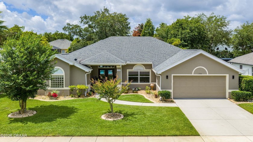 Welcome to this beautifully updated 4-bedroom, 2-bath pool home - Beach Home for sale in Port Orange, Florida on Beachhouse.com