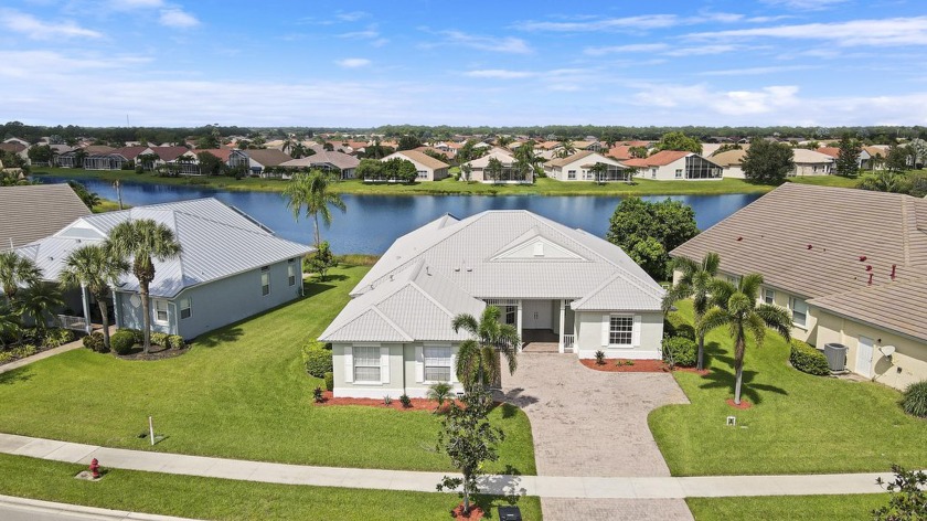 This 4-bedroom, 3-bath home offers plenty of space for your - Beach Home for sale in Port Saint Lucie, Florida on Beachhouse.com