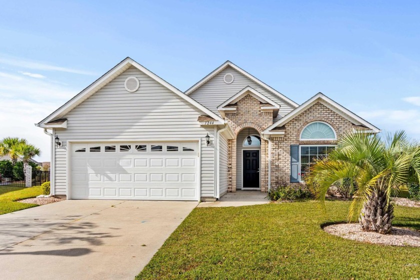 Welcome to 1244 Wayvland Drive in the much sought after gated - Beach Home for sale in Surfside Beach, South Carolina on Beachhouse.com