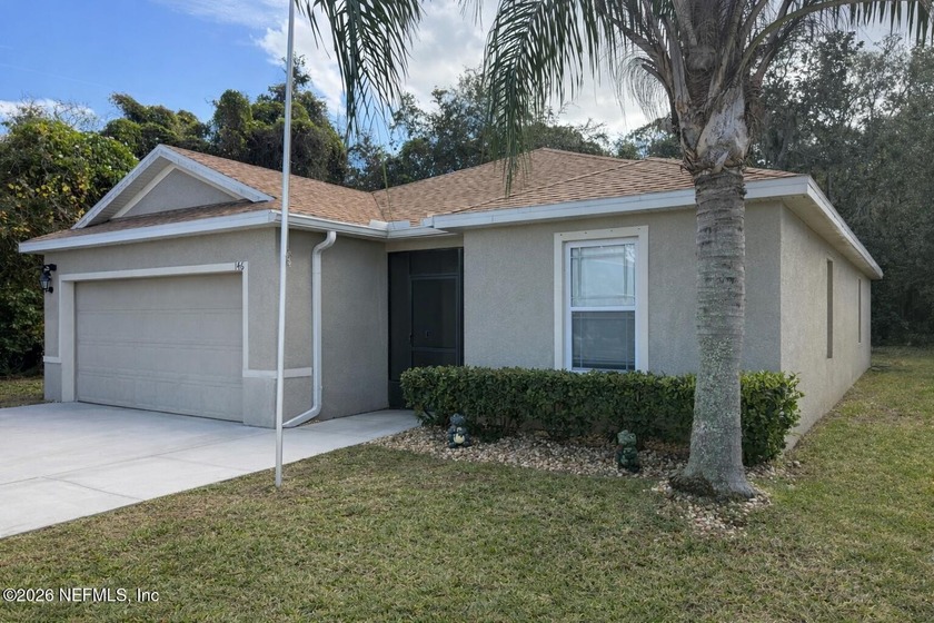 Beautifully maintained 4-bedroom, 2-bath home located in the - Beach Home for sale in Edgewater, Florida on Beachhouse.com