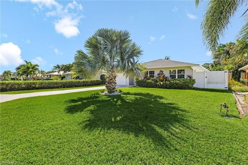 This beautifully maintained 3-bedroom, 2-bath pool home with - Beach Home for sale in Bonita Springs, Florida on Beachhouse.com