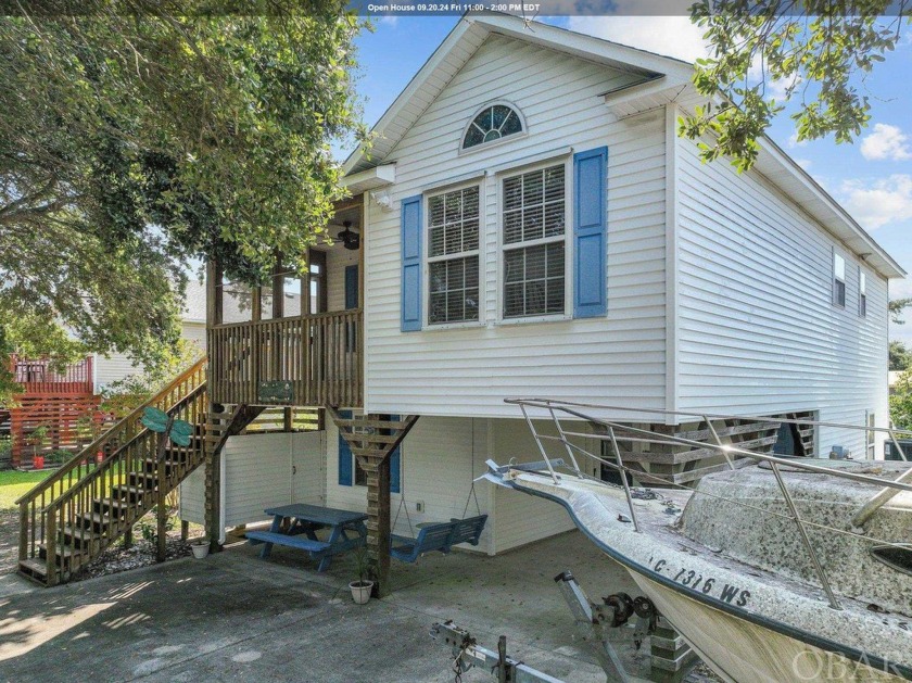 Nestled in a peaceful cul-de-sac between the highways, this - Beach Home for sale in Nags Head, North Carolina on Beachhouse.com