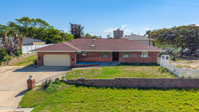 This 3 bedroom, 2 bath, brick home sits in one of the most prime - Beach Home for sale in Port Orange, Florida on Beachhouse.com