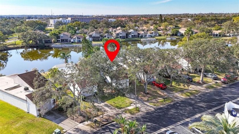 Relaxation Awaits in Your Private Patio Home with Serene Pond - Beach Home for sale in Oldsmar, Florida on Beachhouse.com