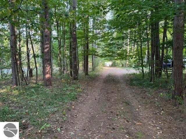 Enjoy wooded seclusion on this 0.87-acre parcel along with an - Beach Lot for sale in Empire, Michigan on Beachhouse.com