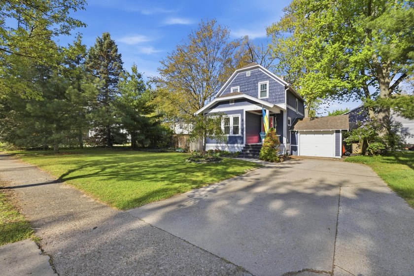 Charming and beautifully updated 2-bedroom, 2-bath home in the - Beach Home for sale in Spring Lake, Michigan on Beachhouse.com