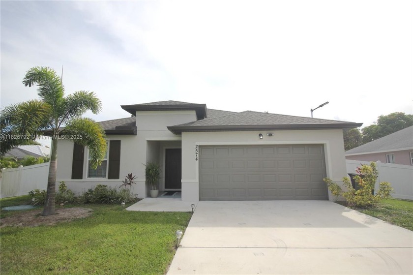 Discover this stunning new construction located in a peaceful - Beach Home for sale in Port Saint Lucie, Florida on Beachhouse.com