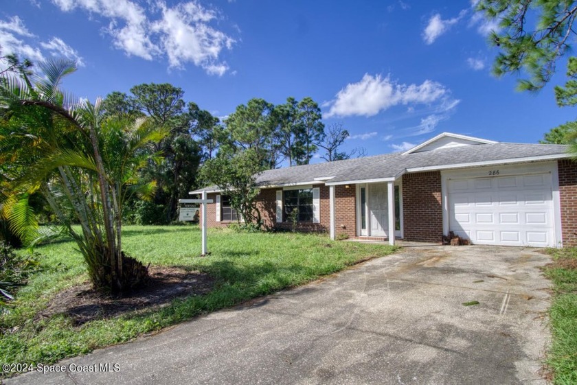 Hurry to this RARE, ONE OF A KIND, .74 ACRE PROPERTY which is - Beach Home for sale in Palm Bay, Florida on Beachhouse.com