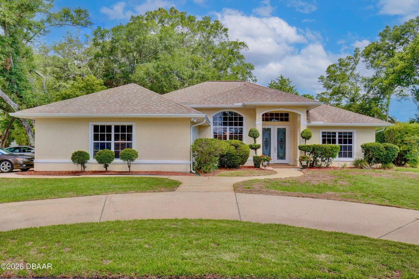 Beautifully maintained 3-bedroom, 2-bath pool home with office - Beach Home for sale in Port Orange, Florida on Beachhouse.com
