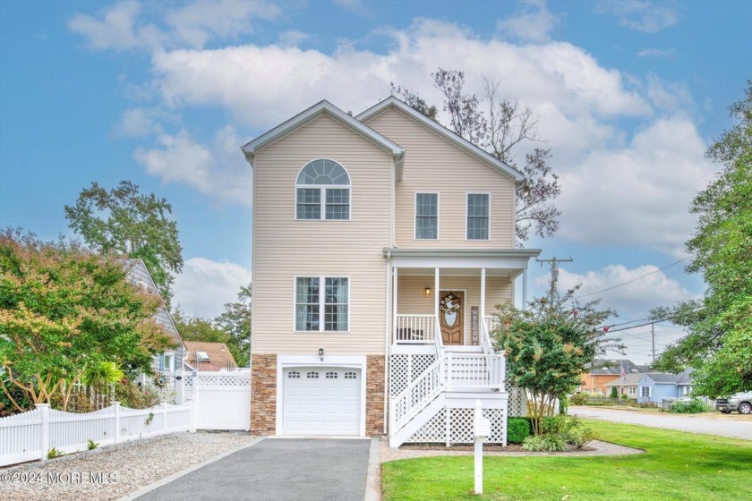 Nestled in the sought-after Nejecho Beach area of Brick, this - Beach Home for sale in Brick, New Jersey on Beachhouse.com