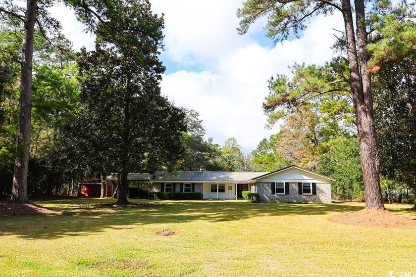 Welcome to 734 Dillon Drive -- a spacious brick ranch situated - Beach Home for sale in Georgetown, South Carolina on Beachhouse.com