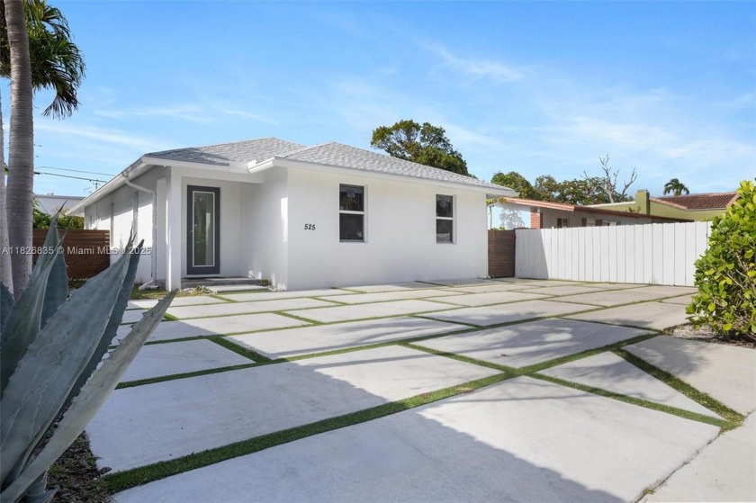 Welcome to this beautifully built 2022 home in the heart of West - Beach Home for sale in West Palm Beach, Florida on Beachhouse.com