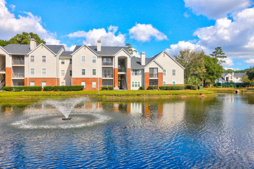 This second floor two bedroom condo offers a serene setting with - Beach Home for sale in Mount Pleasant, South Carolina on Beachhouse.com