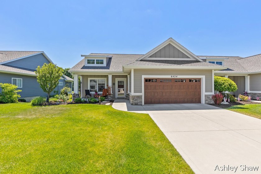 Step into easy living in this Laketown Crossings condo, where - Beach Condo for sale in Holland, Michigan on Beachhouse.com
