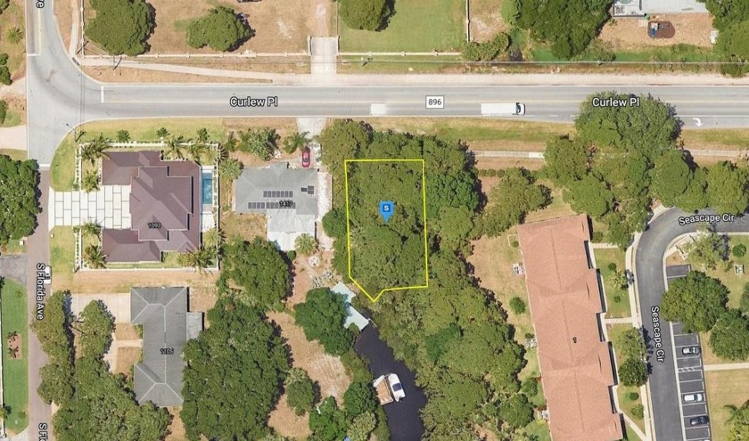 This beautiful .15 acre property in the Coquina Beach community - Beach Lot for sale in Tarpon Springs, Florida on Beachhouse.com