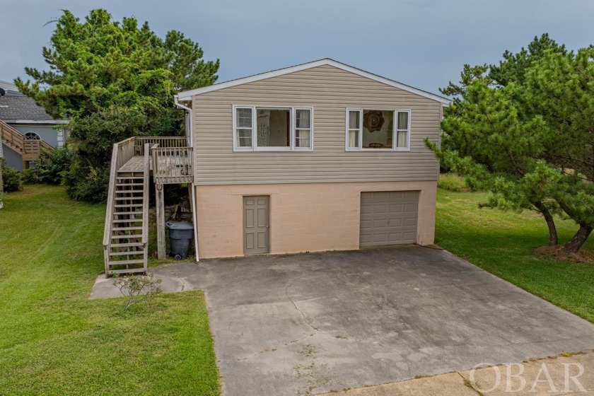 Discover this classic 4-bedroom, 2-bathroom gem in the heart of - Beach Home for sale in Kill Devil Hills, North Carolina on Beachhouse.com