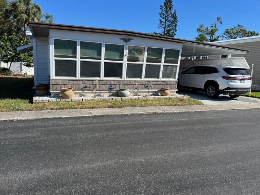 Located in the highly desirable Palm Hill Country Club, this 55+ - Beach Home for sale in Largo, Florida on Beachhouse.com