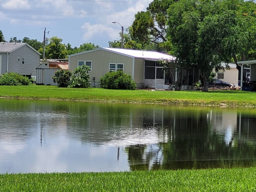 **Charming Lakefront Home for All Ages**    Discover your dream - Beach Home for sale in North Fort Myers, Florida on Beachhouse.com