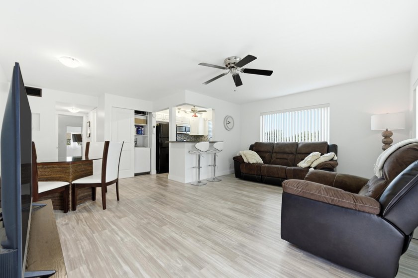 Beautifully updated and move-in ready end-unit offering added - Beach Condo for sale in West Palm Beach, Florida on Beachhouse.com