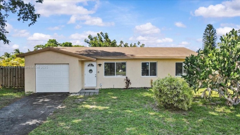 Welcome to 7307 SW 8th St--this beautifully maintained 3-bedroom - Beach Home for sale in North Lauderdale, Florida on Beachhouse.com