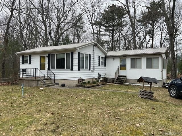 Welcome to this charming 2-bedroom, 1-bath cottage nestled in - Beach Home for sale in Au Gres, Michigan on Beachhouse.com