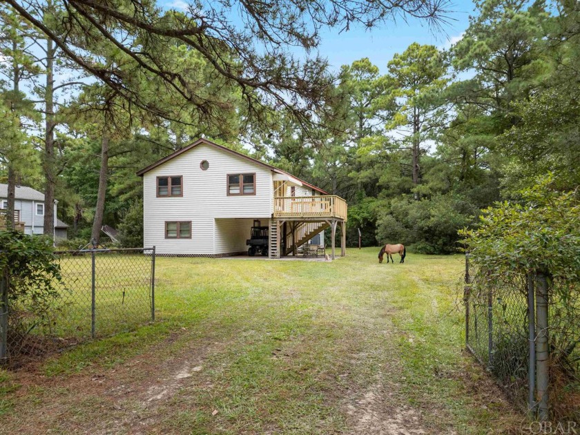 Coastal Charm Near False Cape State Park: Discover the - Beach Home for sale in Corolla, North Carolina on Beachhouse.com