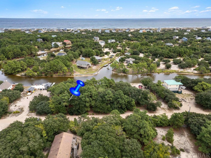 Discover your tranquil oasis on this canal-front lot in Carova - Beach Lot for sale in Corolla, North Carolina on Beachhouse.com