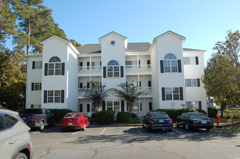 Live your best coastal life in this stunning 3-bedroom, 2-bath - Beach Condo for sale in Myrtle Beach, South Carolina on Beachhouse.com