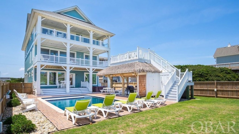 Welcome to this stunning oceanfront luxury estate in the heart - Beach Home for sale in Nags Head, North Carolina on Beachhouse.com