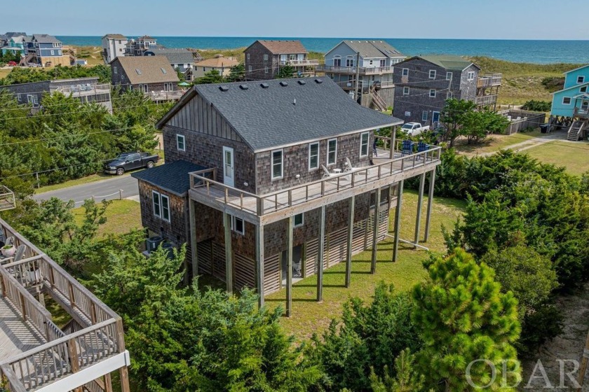 Built in 2020, this stunning semi-oceanfront home is located on - Beach Home for sale in Waves, North Carolina on Beachhouse.com