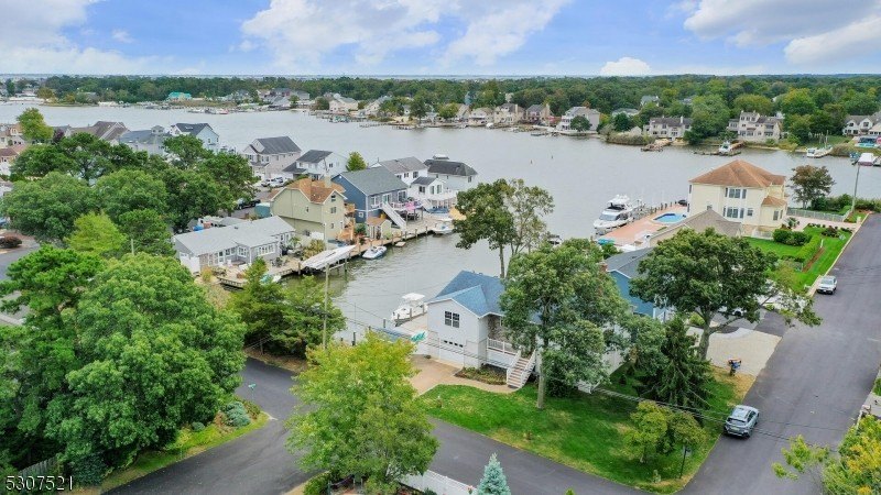 New Price! Lagoon Living at its finest! Lifted & expanded, this - Beach Home for sale in Brick, New Jersey on Beachhouse.com