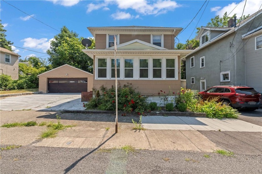 Location, location! This updated 3 Bedroom  (possible 4th - Beach Home for sale in Rochester, New York on Beachhouse.com