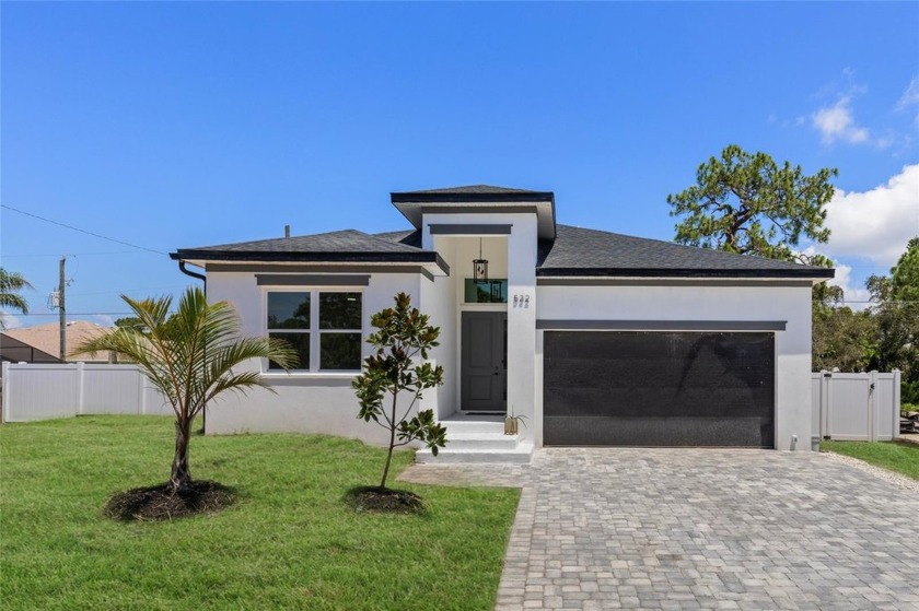 Welcome to this new construction home, where modern elegance - Beach Home for sale in Venice, Florida on Beachhouse.com