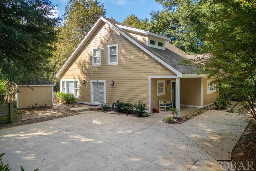 Nestled among the serene trees of Southern Shores, this charming - Beach Home for sale in Southern Shores, North Carolina on Beachhouse.com