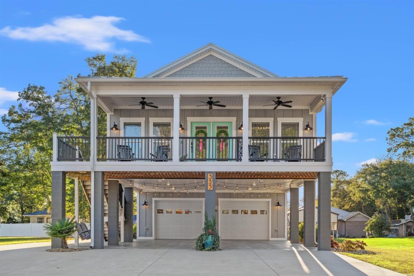 Embrace the perfect blend of luxury and coastal living in this - Beach Home for sale in Murrells Inlet, South Carolina on Beachhouse.com