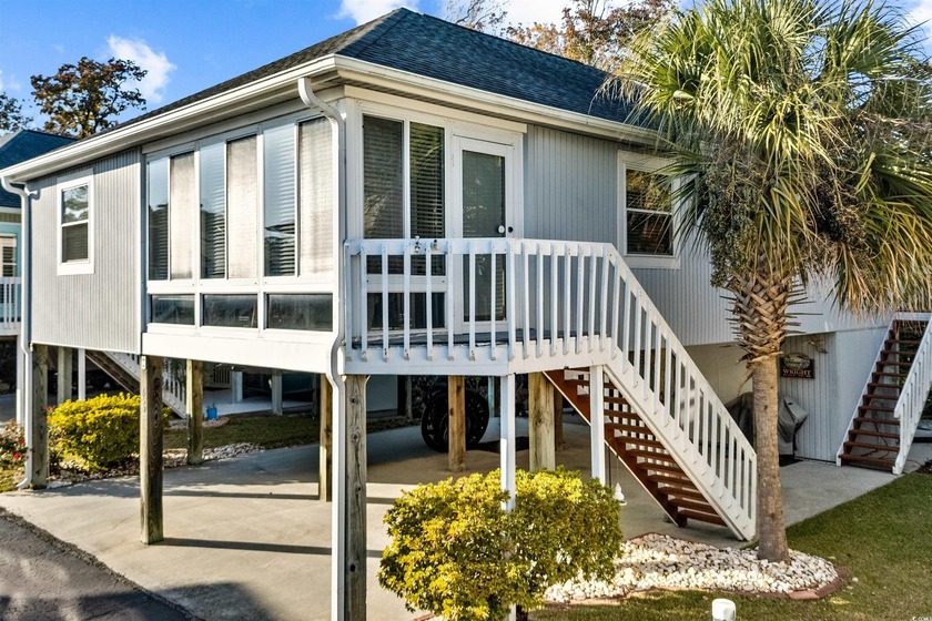Located just a short golf cart ride from the beach, this - Beach Home for sale in North Myrtle Beach, South Carolina on Beachhouse.com