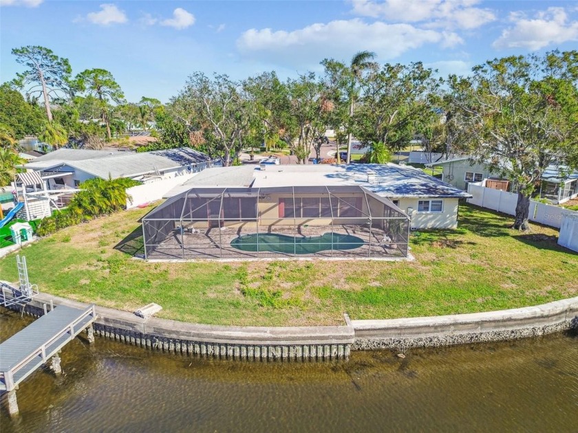 WATERFRONT PROPERTY on a CUL-DE-SAC with a POOL. This property - Beach Home for sale in St. Petersburg, Florida on Beachhouse.com