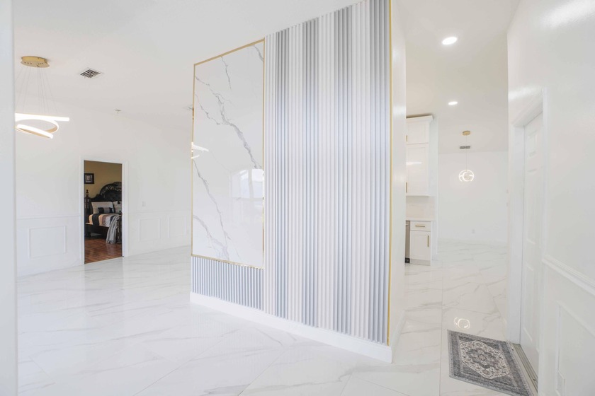 Welcome to this charming 3-bedroom, 2-bath home featuring a - Beach Home for sale in Port Saint Lucie, Florida on Beachhouse.com